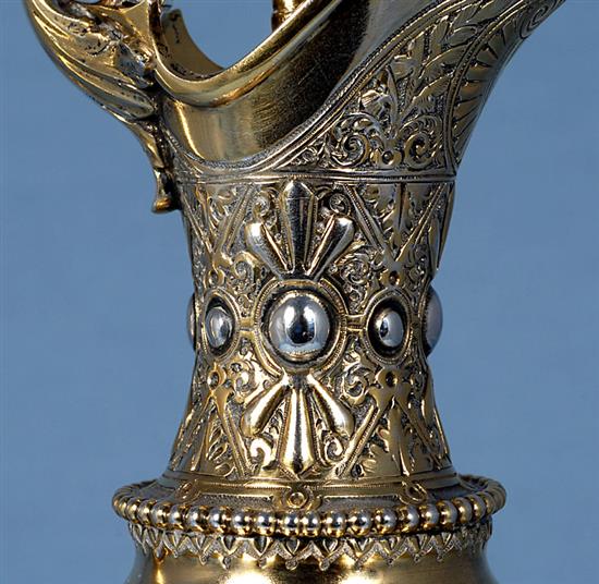 A mid Victorian parcel gilt silver ovoid shaped wine ewer/ claret jug, Height 13 ½”/340mm Weight 23.oz/653grms